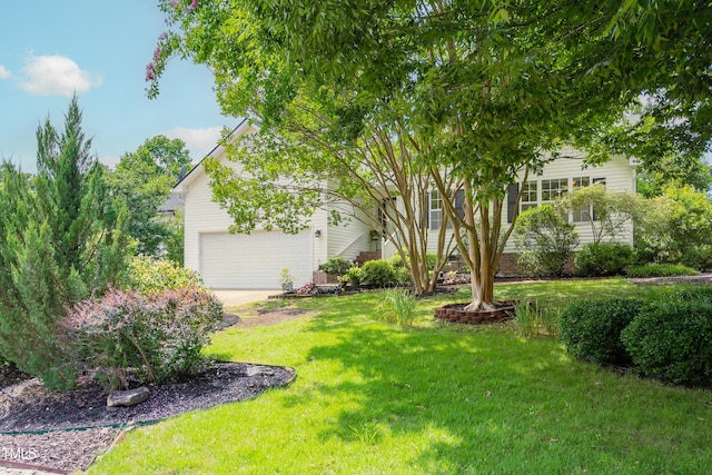 1113 Pilton Pl, Raleigh, NC 27604 - view of grassy yard with concrete driveway and a garage