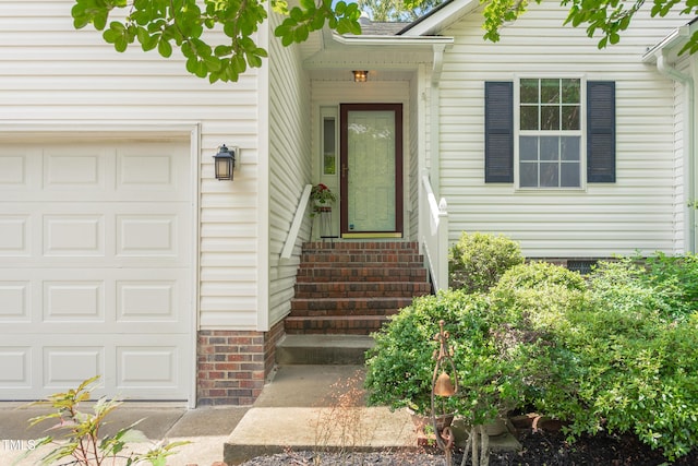 1113 Pilton Pl, Raleigh, NC 27604 - view of exterior entry with a garage