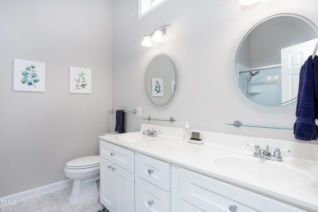 1113 Pilton Pl, Raleigh, NC 27604 - full bath with double vanity, toilet, baseboards, and a shower