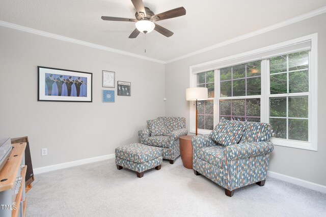 1113 Pilton Pl, Raleigh, NC 27604 - living area featuring ornamental molding, a ceiling fan, carpet flooring, and baseboards