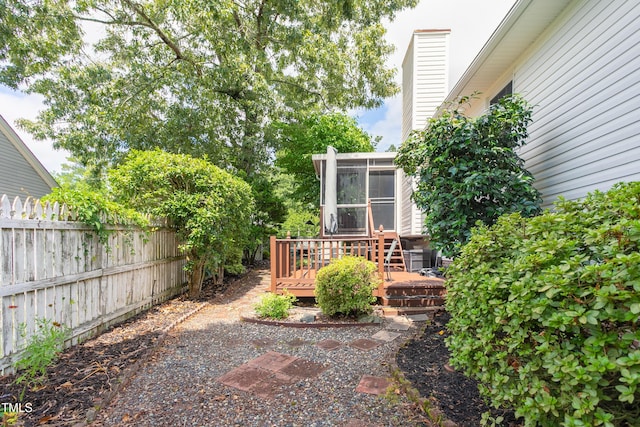 1113 Pilton Pl, Raleigh, NC 27604 - view of yard featuring a sunroom and a wooden deck