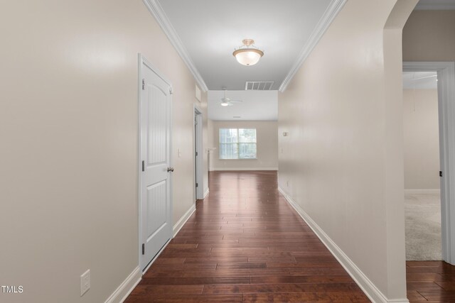 4110 Argyle Trl, Burlington, NC 27215 - hall with arched walkways, crown molding, dark wood-style floors, and baseboards