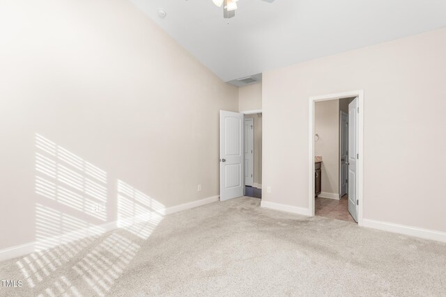 4110 Argyle Trl, Burlington, NC 27215 - unfurnished bedroom with light carpet, baseboards, ceiling fan, and ensuite bathroom