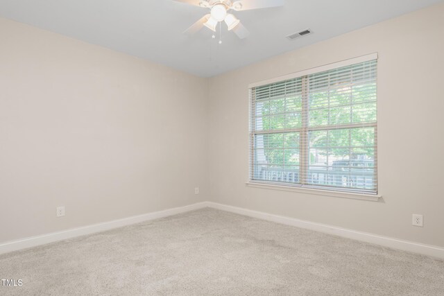 4110 Argyle Trl, Burlington, NC 27215 - carpeted spare room featuring baseboards and a ceiling fan