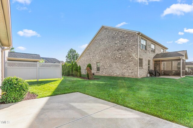 4110 Argyle Trl, Burlington, NC 27215 - view of yard featuring a patio and a sunroom