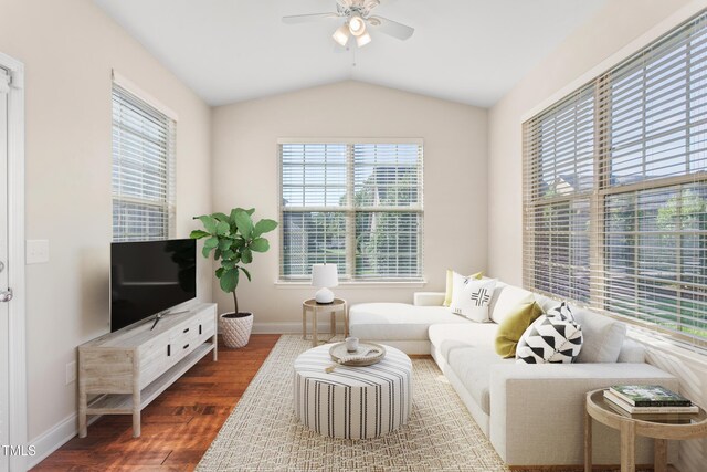 4110 Argyle Trl, Burlington, NC 27215 - living area featuring ceiling fan, wood finished floors, vaulted ceiling, and baseboards