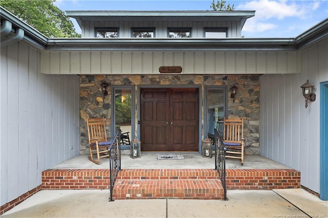 38 E Lndg, Sanford, NC 27332 - view of exterior entry featuring stone siding and covered porch