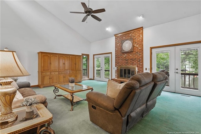38 E Lndg, Sanford, NC 27332 - living area with french doors, light colored carpet, high vaulted ceiling, plenty of natural light, and a ceiling fan