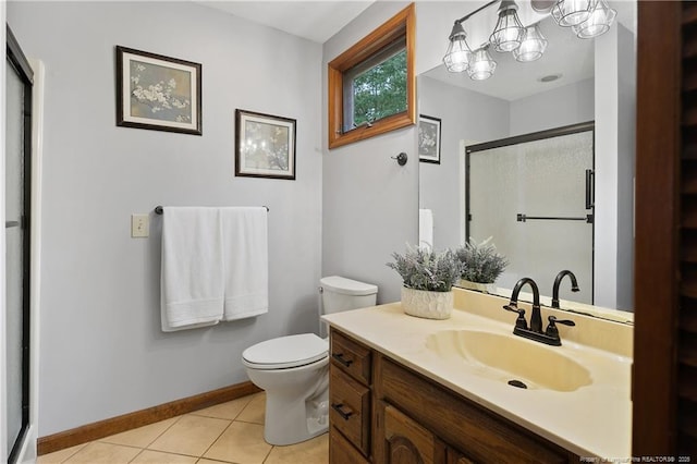 38 E Lndg, Sanford, NC 27332 - full bathroom featuring toilet, vanity, a shower stall, tile patterned flooring, and baseboards