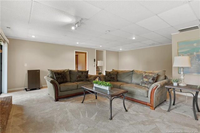 38 E Lndg, Sanford, NC 27332 - living area featuring light colored carpet, a paneled ceiling, and baseboards