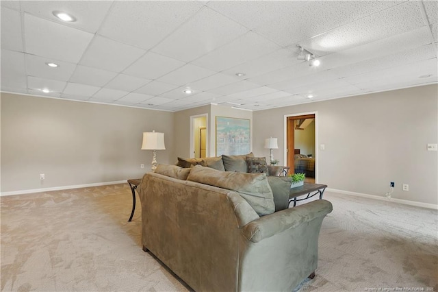 38 E Lndg, Sanford, NC 27332 - living room with light colored carpet, a paneled ceiling, baseboards, and recessed lighting