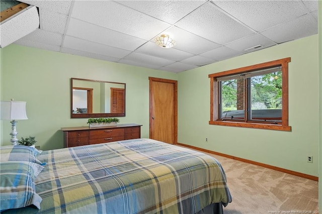 38 E Lndg, Sanford, NC 27332 - bedroom featuring a drop ceiling, light colored carpet, and baseboards