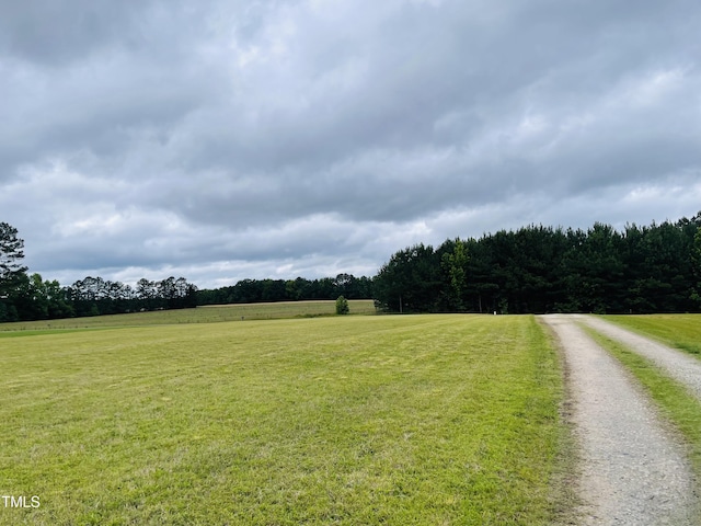 65 Opie Frazier Rd, Henderson, NC 27537 - view of street with a wooded view and a view of rural / pastoral area