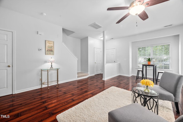 10941 Pendragon Pl, Raleigh, NC 27614 - living room with wood finished floors, ceiling fan, and baseboards