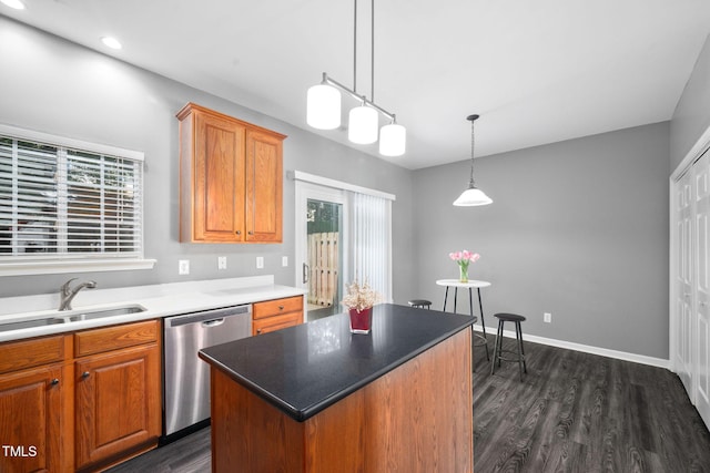 10941 Pendragon Pl, Raleigh, NC 27614 - kitchen with stainless steel dishwasher, a sink, plenty of natural light, dark wood-type flooring, and recessed lighting