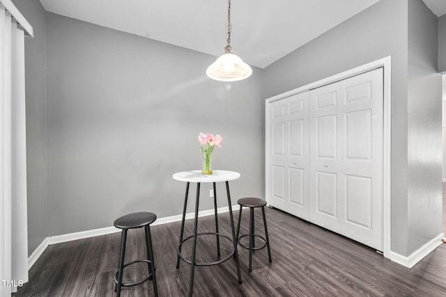 10941 Pendragon Pl, Raleigh, NC 27614 - dining space with dark wood-style flooring and baseboards