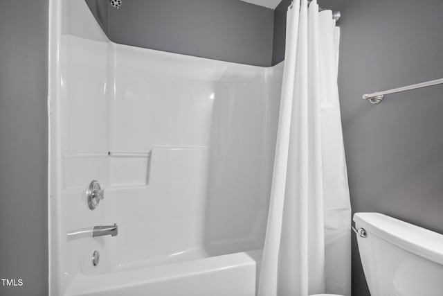 10941 Pendragon Pl, Raleigh, NC 27614 - bathroom featuring shower / bathtub combination with curtain and toilet