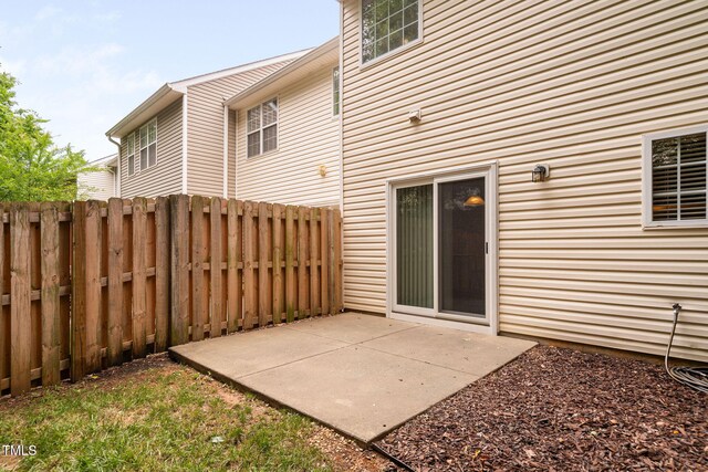 10941 Pendragon Pl, Raleigh, NC 27614 - rear view of property featuring a patio