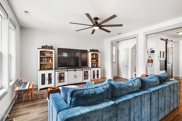 290 Quarter Gate Trce, Chapel Hill, NC 27516 - living area with ceiling fan, wood finished floors, a barn door, and baseboards