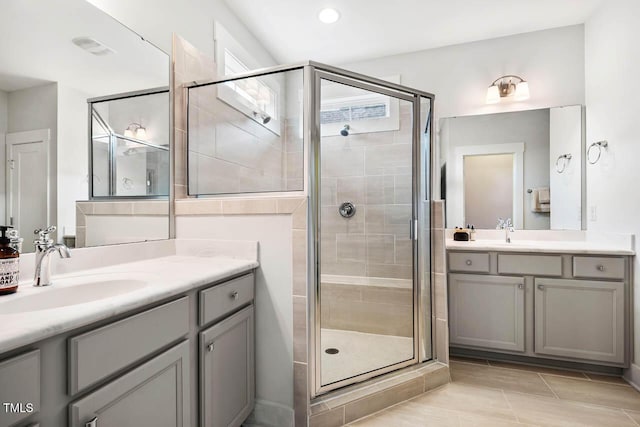 290 Quarter Gate Trce, Chapel Hill, NC 27516 - full bath with a shower stall, two vanities, tile patterned floors, and recessed lighting