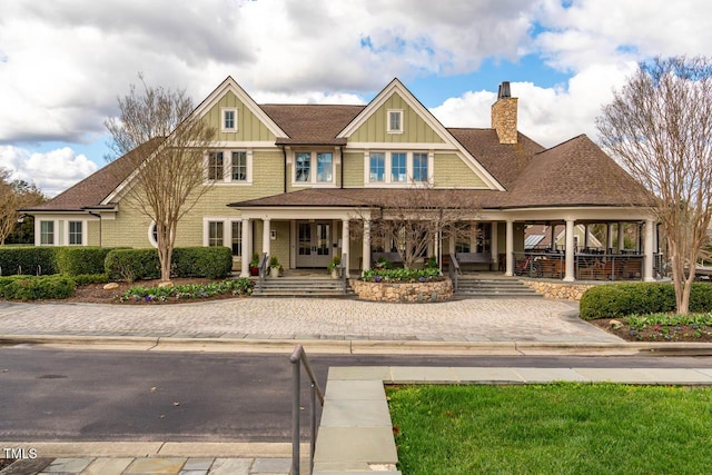 290 Quarter Gate Trce, Chapel Hill, NC 27516 - view of front facade with a chimney, a porch, and a shingled roof