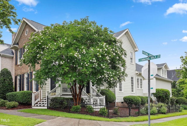 327 Commons Walk Cir, Cary, NC 27519 - view of front facade featuring stairway