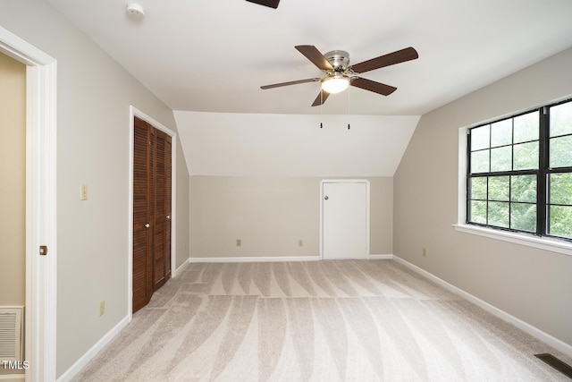2012 Stadium Dr, Durham, NC 27705 - additional living space featuring ceiling fan, lofted ceiling, light carpet, and baseboards