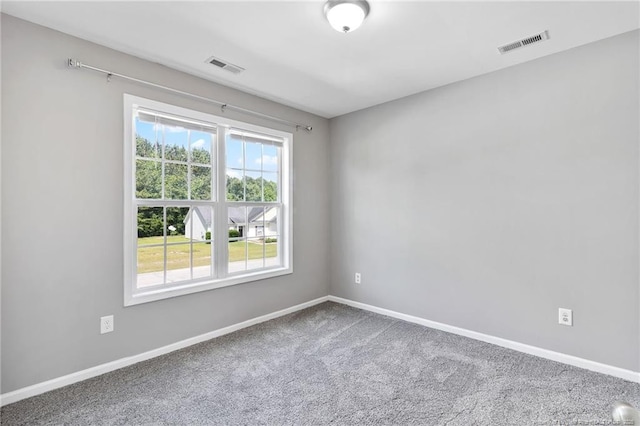 406 Broad Dr, Raeford, NC 28376 - empty room with carpet flooring and baseboards