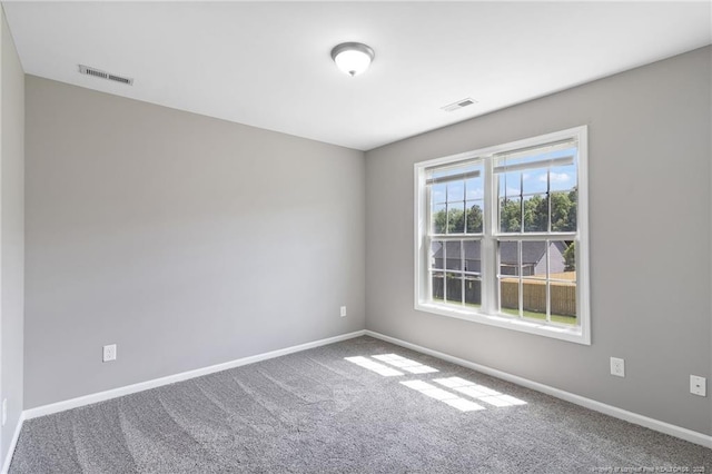 406 Broad Dr, Raeford, NC 28376 - carpeted spare room featuring baseboards