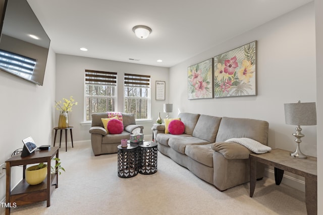 629 Newlyn Dr, Raleigh, NC 27606 - living area featuring carpet floors, baseboards, and recessed lighting