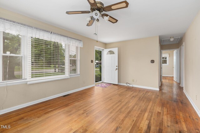 2015 Walnut St, Durham, NC 27705 - foyer featuring wood-type flooring, a ceiling fan, and baseboards