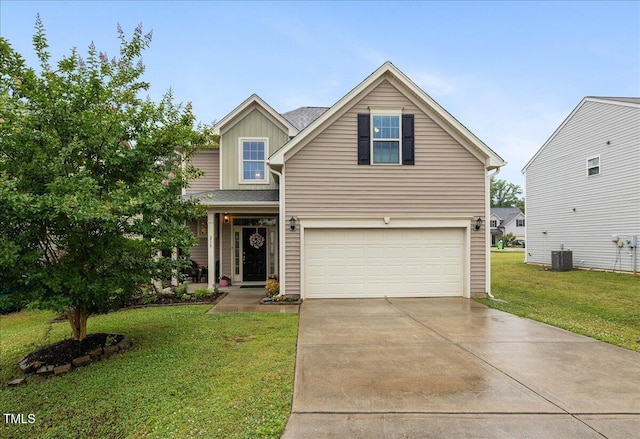 215 Outwater Ridge Dr, Garner, NC 27529 - traditional home with a garage, concrete driveway, a front yard, cooling unit, and board and batten siding