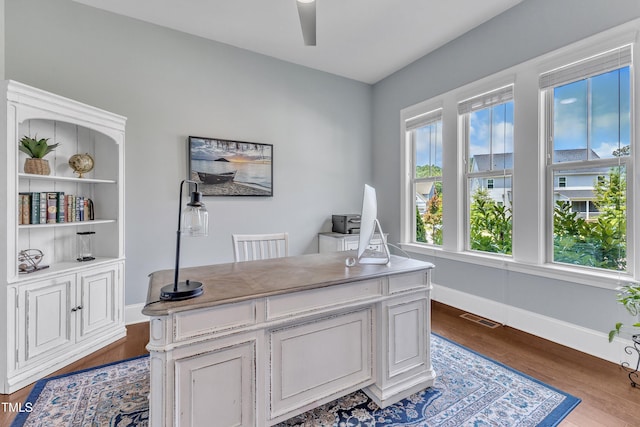 1716 Arberdour Dr, Apex, NC 27502 - office area with wood finished floors, ceiling fan, and baseboards