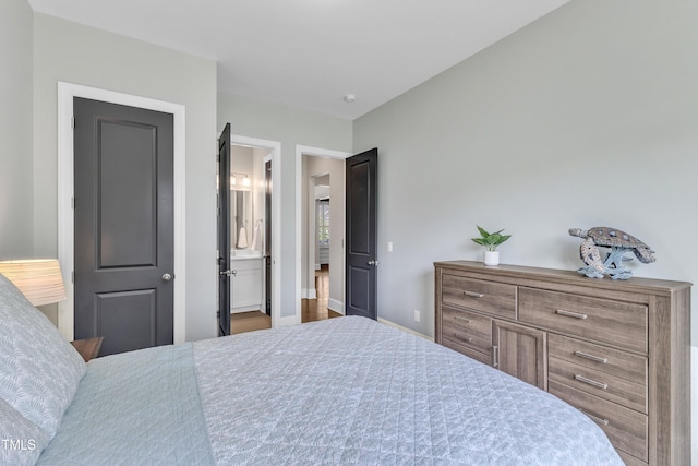 1716 Arberdour Dr, Apex, NC 27502 - bedroom with baseboards and ensuite bath