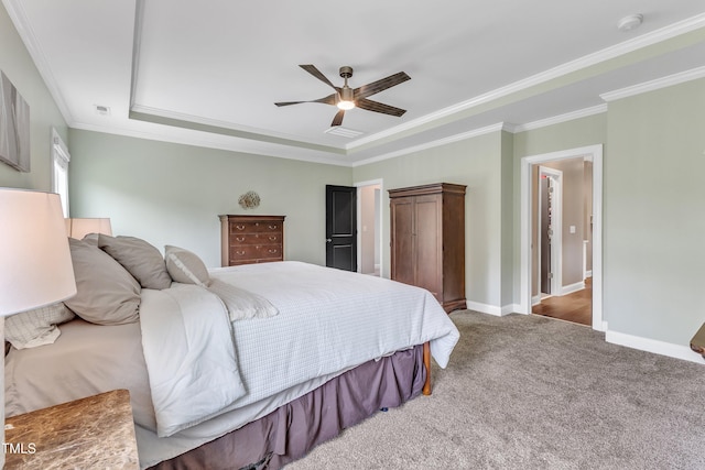 1716 Arberdour Dr, Apex, NC 27502 - carpeted bedroom with a tray ceiling, crown molding, baseboards, and ceiling fan