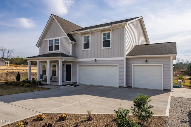 140 Enfield Dr, Carthage, NC 28327 - view of front of house with concrete driveway, a porch, a garage, and roof with shingles