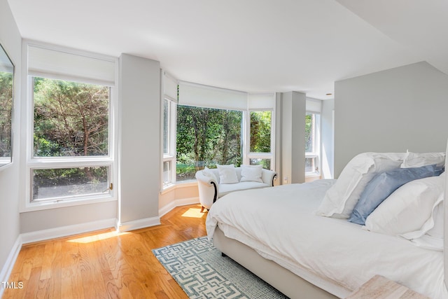 620 Martin Luther King Jr Blvd Unit 302, Chapel Hill, NC 27514 - bedroom with baseboards and wood finished floors