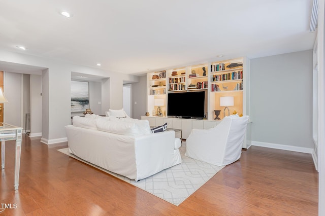 620 Martin Luther King Jr Blvd Unit 302, Chapel Hill, NC 27514 - living room with baseboards, wood finished floors, and recessed lighting