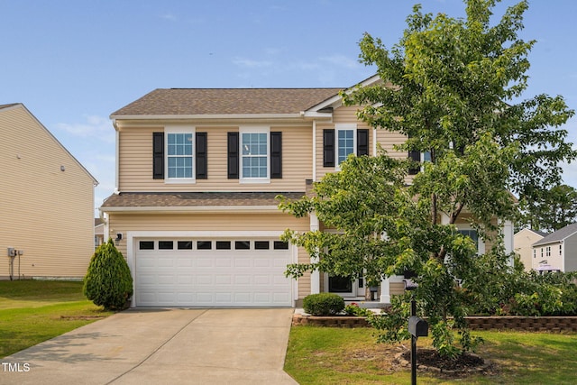 105 Putters Ct, Durham, NC 27703 - view of front facade featuring driveway, a garage, a front yard, and roof with shingles