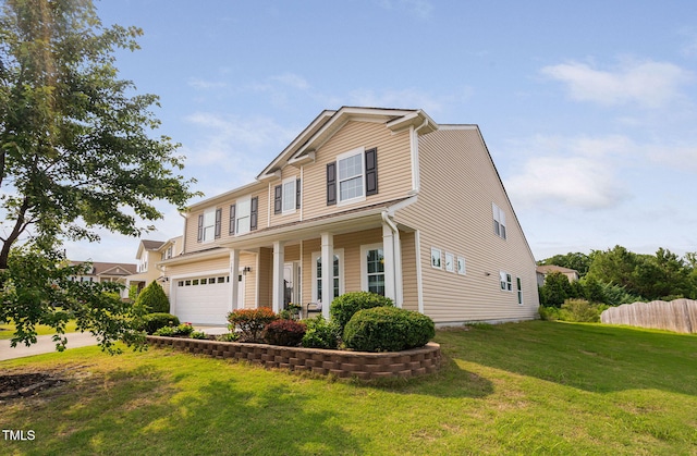 105 Putters Ct, Durham, NC 27703 - view of front of property with covered porch and a garage