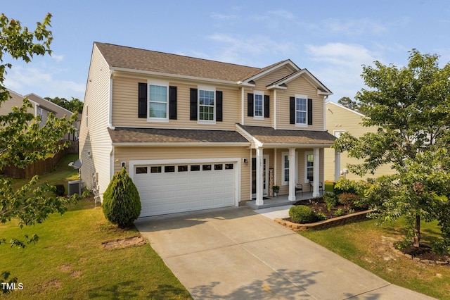 105 Putters Ct, Durham, NC 27703 - traditional home featuring a porch, a garage, concrete driveway, a front lawn, and roof with shingles