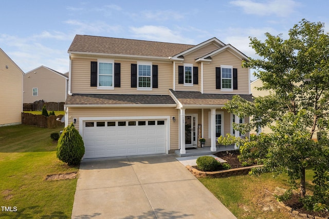 105 Putters Ct, Durham, NC 27703 - traditional-style house featuring a porch, driveway, a garage, and roof with shingles
