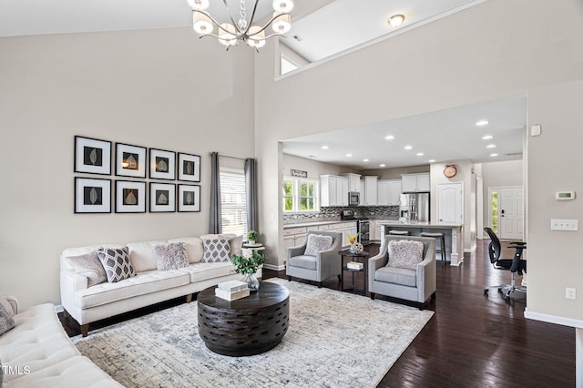 105 Putters Ct, Durham, NC 27703 - living room with a chandelier, dark wood-type flooring, and recessed lighting