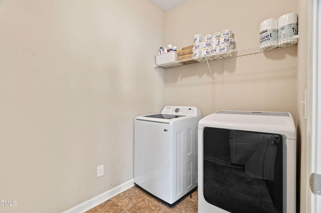 105 Putters Ct, Durham, NC 27703 - laundry area with independent washer and dryer and baseboards