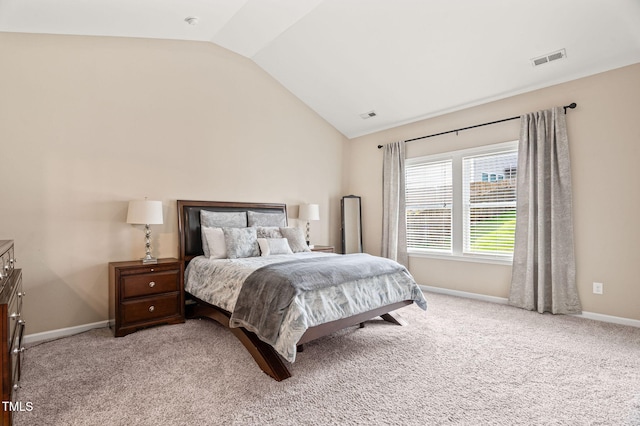 105 Putters Ct, Durham, NC 27703 - bedroom featuring vaulted ceiling and light carpet