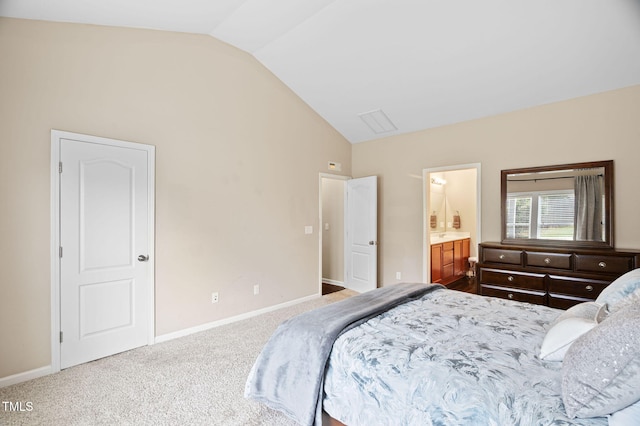 105 Putters Ct, Durham, NC 27703 - carpeted bedroom featuring vaulted ceiling and ensuite bathroom