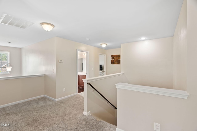 105 Putters Ct, Durham, NC 27703 - corridor featuring an upstairs landing and carpet flooring