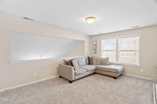105 Putters Ct, Durham, NC 27703 - living area with light colored carpet and baseboards