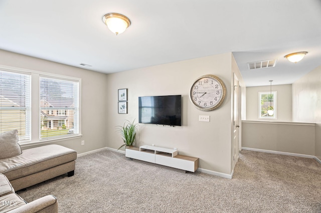 105 Putters Ct, Durham, NC 27703 - living room featuring carpet flooring
