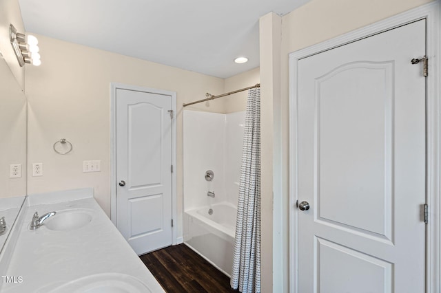 105 Putters Ct, Durham, NC 27703 - full bathroom with wood finished floors, double vanity, shower / bath combo with shower curtain, and recessed lighting